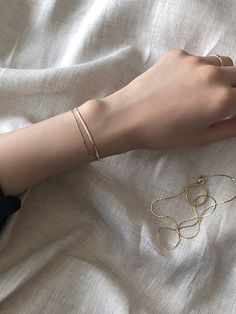 Editor's NotesJewelry collection from LUNNE will flatter any look gracefully.- Silky snake  Chain bracelet- Simple and luxurious- High shine texture- High quality for everyday use- Genuine Gold  not platedMeasurement (in.)- Length: 6 in/ 6.1 in/ 6.3 in/ 6.5 in/ 6.7 in/ 6.9 in/  7.1 in/ 7.3 in/ 7.5 in.Composition & Care- 14K Gold- Avoid direct heat and moisture- Wipe with a dry clothDesigner- by LUNNE Modern Everyday Snake Chain Bracelet, Minimalist Flexible Chain Bracelet, Minimalist Flexible Chain Bracelet For Formal Occasions, Elegant Gold Snake Chain Bracelet For Everyday, Elegant Everyday Gold Snake Chain Bracelet, Minimalist Everyday Flexible Gold Bracelet, Gold Jubilee Bracelet With Snake Chain, Everyday Minimalist Flexible Gold Bracelet, Minimalist Flexible Chain Bracelet For Everyday