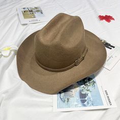 Product Category: Cowboy HatSuitable season: autumnHat style: high topHat brim style: wide brimColor: black, haze gray, dark brown, khaki, white, royal blue, bright red, lake blue, gray, dragon fruit color, burgundy, rose red, dark green, light brown, camel, navy blue, beigeSize: M (57cm), L (59cm)Function: warmth, sunshadeStyle: Versatile, elegant, casual, fashionable OL, simple, European and AmericanStyle Category: Fashion Commuting Vintage Fedora For Outdoor Fall Events, Trendy Wide Brim Fedora For Country Events, Casual Wide Brim Felt Hat For Ranch, Brown Fedora For Rodeo In Fall, Trendy Brown Fedora For Rodeo, Trendy Fedora Hat Bands For Ranch, Trendy Fedora Ranch Hat, Trendy Brown Hat Bands For Winter, Trendy Brown Winter Hat Bands