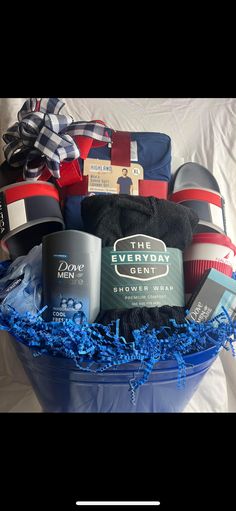 a blue basket filled with lots of different items