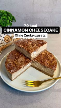 a piece of cheesecake on a plate with a fork next to it and the words cinnamon cheesecake one zuckerzutz