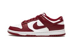 The Nike Dunk Low "Team Red" has been a footwear staple for over 35 years, but as of late, it's been one of the hottest models in sneaker culture.  Originally created as a basketball shoe, the low-top, lace-up silhouette is now known as an off-duty pair for the streets.  The casual Nike sneaker is outfitted with a laidback dark red and white color scheme on the premium leather upper—white covers the base, while red adds a bold touch on the overlay detailing.  The Nike Dunk Low sneaker is finishe Nike Dunk Low Team Red, Red Dunks, Shein Cart, Nike X Travis Scott, Cool Kicks, Custom Made Shoes, All Nike Shoes, Team Red, Dunks Nike