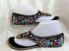 Casual, colourful shoes and sandals in leather from India: Fashion footwear for the contemporary city dweller, from five centuries back. Mumtaz, the lady for whom the Taj Mahal was built probably lived in shoes and sandals much like these. Originally meant for the Maharajahs and the Maharanis [Kings and Queens and such royalty], these handcrafted fashion footwear for men and women mainly come from the villages of Punjab and Rajasthan. This period fashion piece was introduced to India during the Traditional Blue Closed Toe Sandals, Traditional Sandals With Zari Work For Festivals, Traditional Sandals With Dori Work For Festivals, Traditional Open Toe Huarache Sandals, Festive Sandals With Zari Work For Diwali, Festive Dori Work Sandals, Festive Closed Toe Sandals For Puja, Traditional Blue Open Toe Sandals, Festive Cutdana Sandals For Festivals