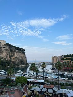 boats are docked at the marina in nice weather