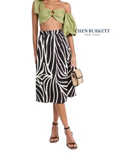 The Cara Skirt in modern take on a classic zebra print. Its midi length and high-waisted cut ensures it will remain a wardrobe staple no matter the season. Polyester  Side seam pockets Falls below knee Colours: Black Brown/Ivory Unlined Side zipper closure  34" length RTW shipping in 5-7 days  Size S Waist 27" - 28" Size M Waist 29" - 30" Size L Waist 31.5" - 33" Size XL Waist 34.5" - 36"  Size XXL Waist 37.5 - 39" GARMENT CARE: All pieces are Dry Clean only  Due to the custom nature of our work Cara Skirt, Zebra Print Skirt, Print Skirt, Printed Skirts, Zebra Print, Midi Length, Wardrobe Staples, Side Zipper, Black And Brown