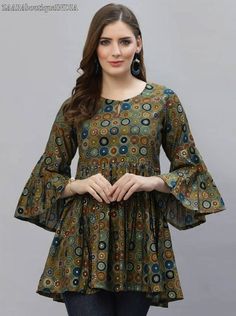 HAND CRAFTED TUNIC DESCRIPTION *Green and blue printed tunic ,has a round neck, three-quarter sleeves, *Fabric:- Modal *Wash Care:- MACHINE WASH AVAILABLE IN 6 SIZES THEY ARE IN FOLLOWING MEASUREMENTS IN INCHES:- XS:- Bust-34/Waist In-30/Length-30 S:- Bust-36/Waist In-32/Length-30 M:- Bust-38/Waist In-34/Length-30 L:- Bust-40/Waist In-36/Length-30 XL:- Bust-42/Waist In-38/Length-30 XXL:- Bust-44/Waist In-40/Length-30 NOTE ►►CUSTOMISATION We do customisation ️ ►►TRACKING We give full tracking to College Style Outfits, Short Kurti Designs, Women Tops Design, Green Top Women, Cotton Tops Designs, Kurti Top, A Line Kurti, Kurtis For Women, Stylish Kurtis Design