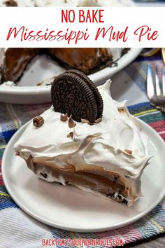 no bake mississippi mud pie with oreo cookies on top and white frosting