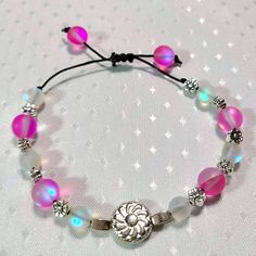 Brand New Handcrafted Daisy Bracelet. Beautiful Pink Tones With Multicolored Beads And Daisy/Flower Embellishments. Silver Colored Metal Embellishment. Made Of Plastic, Nylon, And Metal. Has An Adjustable Slide Knot To Fit Many Wrist Sizes. Great To Pair With Another Handcrafted Bracelet From My Closet And Can Easily Match Any Outfit Style. Adjustable Multicolor Crystal Bracelet With Silver Beads, Adjustable Silver Jewelry With Colorful Beads, Silver Beaded Bracelets With Colorful Beads, Silver Crystal Bracelet With Colorful Beads, Spiritual Style, Spiritual Silver Crystal Bracelet With Colorful Beads, Adjustable Silver Beaded Crystal Bracelet, Adjustable Crystal Bracelet With Silver Beads For Jewelry Making, Adjustable Crystal Bracelet With Silver Beads, Sterling Silver Heart Bracelet