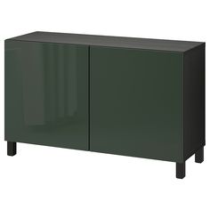 a green cabinet with two doors and black legs