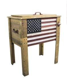 an american flag painted on the side of a wooden table with drawers and handles,