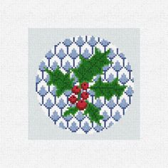 a cross stitch pattern with holly leaves and berries in the center on a white background