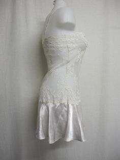 "Short White Lace and Satin Nightgown Unbelievably adorable! Sheer Baby doll /white nightie! Tons of lace with a satin flouncy skirt This is sassy! (Like You!) Small 36\" bodice 40\" Hip 32\" length Easy care poly GREAT for brides! https://www.etsy.com/shop/BelindasStyleShop" Fitted Camisole Dress For Wedding Night, White Ruffled Camisole Dress, Fitted Delicate Lace Nightgown For Sleep, Fitted Sheer Satin Nightgown, White Sheer Slip Dress For Party, Fitted Satin Slip Dress With Lace Patchwork, Sheer White Nightgown For Parties, Sleeveless Lace Nightgown For Party, Fitted Night Slip Dress With Delicate Lace