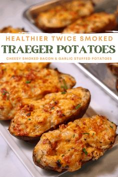 two baked potatoes sitting on top of a white plate next to each other with the words, healthier twice smoked traeger potatoes