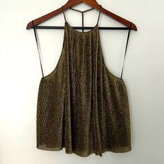 New Never Worn Crimped Gold Black Halter Top Gold Top For Spring Party, Gold Party Top For Spring, Gold Shimmer Tops For Night Out, Spring Party Tops With Shine Detail, Gold Tops For Holiday Party, Holiday Party Gold Tops, Gold Holiday Party Tops, Chic Glitter Tops For Festive Occasions, Chic Glitter Top For Festive Occasions