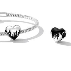 This is charm only, bracelet is sold separately.The black dripping heart charm features nice contrast dripping heart design in black and silver color made of solid 925 sterling silver and enamel color decoration. Get ready to add a touch of edginess and elegance to your charm bracelet with our black dripping heart charm! Made of solid 925 sterling silver with enamel color decoration, this bead charm features a stunning contrast of black and silver that will surely turn heads. Whether you're goin Dripping Heart, Color Decoration, Silver Bead, Enamel Jewelry, Heart Beads, Black And Silver, Sterling Silver Bead, Heart Design, Solid 925 Sterling Silver