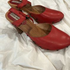 Steve Madden Red Leather Wooden Heeled Clogs Size 39 Worn Once; Like New! Red High Heel Mules With Wooden Heel, Leather Clogs With Red Sole And Round Toe, Red Open Toe Clogs With Wooden Heel, Casual Red Heels With Wooden Heel, Red Clogs With Removable Insole And Round Toe, Red Leather Clogs With Block Heel, High Heel Clogs With Leather Sole, Red Block Heels With Wooden Heel, Spring Red Clogs With Wooden Heel