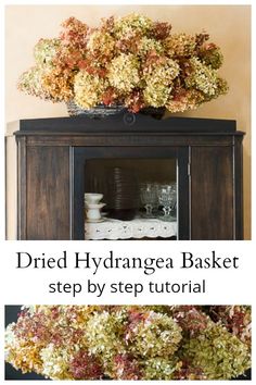 an old hutch with flowers on top and the words, dried hydrangea basket step by step