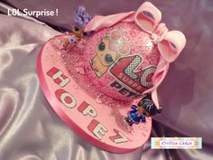 a pink hat that is sitting on top of a bed with the word hope written in large letters