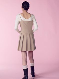 This is a sleeveless mini dress with an attractive minimalist vibe. The light length and cut lines on the body create a slim body line, and the pleated details on the skirt add a casual yet feminine mood.- You can adjust the length of the shoulder straps to fit your body shape.- Open and close with side zipper- Can be worn alone or layered with innerwear such as a T-shirt*The color of the product may differ from the actual color depending on the monitor resolution. Feminine Mini Dress With Pleated Waist, Beige Fitted Pleated Midi Dress, Beige Pleated Mini Dress, Spring Pleated Mini Dress, Spring Mini-length Pleated Dress, Chic Beige Knee-length Mini Dress, Spring Sleeveless Mini Dress With Pleated Hem, Sleeveless Mini Dress With Pleated Hem For Spring, Beige Pleated Skirt Dress