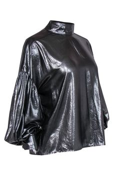 Get sparkling and stunning in this shining silver blouse from Closed. Made with a mock neckline, this balloon sleeved beauty is a metallic marvel, perfect for pairing with flared pants for a disco look, or go totally cool with some leather leggings. Size M 100% Polyester Mock neckline Long puffed sleeves Back button closures Waist 43" Total length 24" Disco Look, Silver Blouse, Silver Balloon, French Girl Chic, Mock Neck Blouse, Chic Shop, Buy Shoes Online, Mock Neckline, Long Puff Sleeves