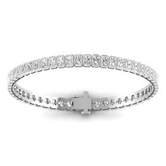 The bezel set shaped diamond tennis bracelet is handcrafted in 14K or 18K yellow, rose, or white gold, and round, brilliant-cut white diamonds. A beautiful bracelet with timeless appeal that can be worn anywhere. It makes the perfect gift for yourself or someone you love, because diamonds are always forever. 14K & 18K gold 7.70 cts radiant cut diamonds 48 diamonds D-E-F color white diamonds 11.78 grams gold Diamond clarity is VVS-VS Secure insert clasp with safety link for safety, diamonds conti Luxury Diamond White Tennis Bracelet With Bezel Setting, Timeless Diamond Tennis Bracelet With Bezel Setting, Elegant Diamond Tennis Bracelet With Bezel Setting, Luxury Tennis Bracelet In Diamond White With Bezel Setting, Elegant White Gold Tennis Bracelet With Bezel Setting, Diamond White Tennis Bracelet With Bezel Setting, Elegant Diamond White Tennis Bracelet With Bezel Setting, Diamond Tennis Bracelet With Bezel Setting For Anniversary, Elegant Tennis Bracelet In Diamond White With Bezel Setting