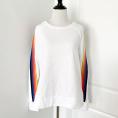 White Rainbow Sleeve Sweatshirt Brand New With Tags! Size Small White Sporty Color Block Sweater, Sporty White Color Block Sweater, White Relaxed Fit Color Block Sweatshirt, White Color Block Sweatshirt For Loungewear, White Cotton Color Block Sweater, White Color Block Long Sleeve Tops, White Color Block Tops For Loungewear, White Long Sleeve Color Block Top, Casual Rainbow Crew Neck Sweatshirt