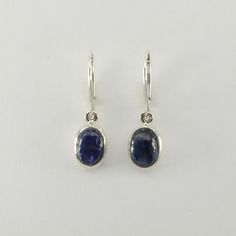 This is a  beautiful pair of Blue Kyanite Earrings in 925 Sterling Silver. They are made out of Sterling Silver with no nickel so there should be no allergic reaction and nothing will turn green. The silver is not only silver plated or steel but solid 925 Sterling Silver. We usually ship the same day in a nice gift box. Classic Oval Earrings With Ear Wire, Oval Sterling Silver Earrings With Polished Finish, Classic Oval Sterling Silver Earrings, Blue Sterling Silver Earrings With Polished Finish, Classic Nickel-free Oval Earrings, Formal Oval Sterling Silver Earrings, Blue Oval Hallmarked Earrings, Classic Blue Earrings For Everyday, Classic Blue Nickel-free Earrings