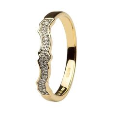 a gold ring with diamonds on it