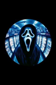 the scream movie poster with an image of a person wearing a ghost mask and screaming