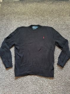 like new - never worn this item is pre owned vintage. please reach out with any questions and view all photos for details on condition. happy to send additional photos and measurements upon request.  thanks for viewing! -Purple Steez Vintage Black Crew Neck Polo Sweater, Black Long Sleeve Polo Sweater, Black Ralph Lauren Sweater, Luxury Black Knit Polo Sweater, Vintage Black V-neck Sweater, Ralph Lauren Jumper, Black Polo, Vintage Polo Ralph Lauren, Black Knit