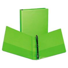 two green binders are stacked on top of each other and one is closed up