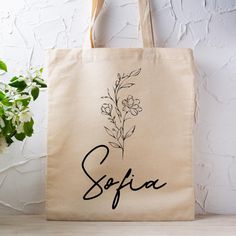 Concise Tote Bags: ✅Discover the perfect blend of durability and style with our tote bags! Made from 100% polyester, our medium-weight fabric (6.49 oz/yd² or 200 g/m²) ensures lasting quality for everyday use. ✅ Choose from 5 color handle options to customize your look. Each tote features a non-woven laminate inside, cotton handles, and comes in 3 sizes, including 1 large storage compartment, to meet all your customers' needs. ✅Upgrade your carry-all essentials with our versatile and resilient t Custom Flowers, Cloth Tote Bag, Flower Tote Bag, Tote Bag Custom, Flower Tote, Floral Tote Bag, Bag Canvas, Oxford Fabric, Personalize Bag