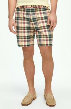 Soft cotton madras woven in a bright plaid brings sunny-day comfort to shorts styled with a classic flat front and a relaxed, all-occasion feel. 7" inseam; 20" leg opening; 11" front rise; 15" back rise (size 32) Zip fly with button closure Front slant pockets; back button-welt pockets 100% cotton Dry clean or machine wash, tumble dry Imported Casual Plaid Cotton Shorts, Casual Plaid Shorts, Preppy Plaid Cotton Shorts, Plaid Cotton Shorts For Daywear, Casual Plaid Bottoms With Built-in Shorts, Summer Plaid Cotton Bottoms, Preppy Cotton Shorts For The Beach, Preppy Cotton Shorts For Beach, Preppy Cotton Beach Shorts