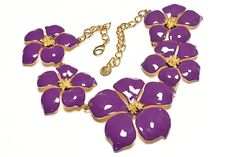 Carolina Herrera Set.Indulge in the luxurious elegance of the Carolina Herrera Purple Enamel Flower Earrings Necklace Set. This exquisite set features delicate purple enamel flowers that are both stylish and sophisticated. Complete your look with this exclusive set, perfect for any occasion. Elevate your style to a higher level with Carolina Herrera. Necklace Length 20", adjustable, Earrings Diameter 1.25". Elegant Lavender Flower Jewelry, Elegant Lavender Flower Shaped Jewelry, Purple Flower-shaped Formal Jewelry, Elegant Purple Jewelry With 3d Flowers, Elegant Enamel Flower Shaped Jewelry, Enamel Flower-shaped Jewelry For Wedding, Elegant Enamel Flower Earrings, Elegant Enamel Flower Pendant Jewelry, Yellow Enamel Flower Shaped Jewelry