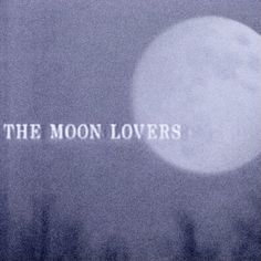 the moon lovers logo is shown on a foggy night with trees in the background