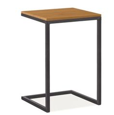 a square wooden table with metal legs