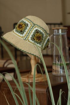 This sunflower cotton-straw sun hat is my favorite for this summer.  It is cute, stylish and breathy from summer heat.  BAG CROCHET PATTERN (PDF+VIDEO TUTORIAL)  This listing is for an INSTANT DOWNLOAD Well detailed Crochet HAT PATTERN, not a finished HAT #MATERIAL# What I use for this bag are:  *Eco cotton yarn 50g in each colour *Cotton straw yarn or raffia straw yarn 100g *2.5mm or 3mm crochet hook You can adjust to what you have or what you like , it doesn't need to be the exactly same. More information you could find in the pdf. #SKILL LEVEL# Experienced Beginner #DOWNLOADED FILES# PDF patterns are well-detailed written in English  Feel free to message me for any questions! **We cannot accept returns or issue refunds on any of our patterns.** Crochet Sun Hat Pattern, Sun Hat Pattern, Motifs Granny Square, Detailed Crochet, Sunflower Hat, Crochet Sun, Heat Bag, Crochet Sun Hat, Granny Square Pattern