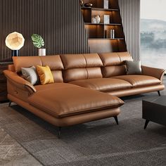 a modern living room with brown leather furniture