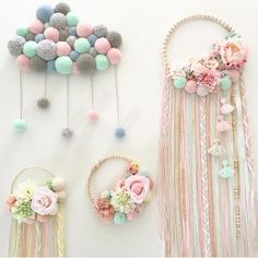 three wall hangings with flowers and beads on them