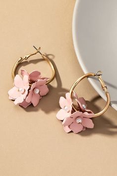 Color coated flower cluster hoop earrings. Size: 1.5" x 2.0" Materials: Base Metal and Matte Gold Plated Feminine Drop Earrings For Spring, Spring Flower Shaped Jewelry With 3d Flowers, Spring Flower Jewelry With 3d Flowers, Chic Spring Jewelry With Flower Charm, Spring Jewelry With 3d Flowers, Spring Rose Gold Drop Earrings, Rose Gold Drop Earrings For Spring, Spring Feminine 3d Flowers Jewelry, Trendy Hoop Earrings With Flower Charm For Spring