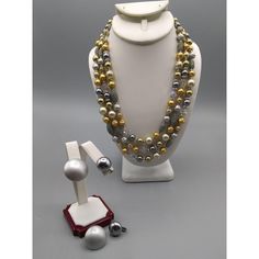 "Vintage Japan Parure Jewelry Set, Silver and Gold Tone with Gray Faux Pearl Beads and Crystals Multi Strand Necklace and Matching Earrings Measurement * Necklace 19\" with 2\" extender ; Earrings 1 Pr Clip On, 1Pr Stud Condition * Very good condition. Gently worn with minimal wear. SIZE: Womens OS, adjustable CONDITION: Pre-Owned Good" Elegant Beaded Jewelry For Holidays, Holiday Gold Beaded Jewelry, Elegant Multicolor Jewelry For Holidays, Elegant Multicolor Holiday Jewelry, Holiday Party Beaded Jewelry, Sugar Beads, Baby Jewelry, Vintage Japan, Multi Strand Necklace