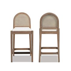 two wooden chairs with white upholstered back and seat cushions, side by side