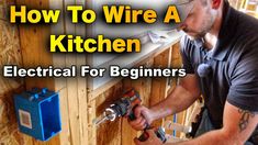 a man working on a kitchen wall with the words how to wire a kitchen electrical for beginners