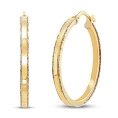 These dazzling women's earrings feature a wide bar of lustrous 14K yellow gold trimmed by a shimmering line of white rhodium to complete the look. The earrings secure in place with snap-lock backs. From the Italia D'Oro Verona Collection. Exclusively available from Jared® the Galleria of Jewelry. Luxury Hoop Jewelry With Shiny Finish, Fine Jewelry Hoop Earrings With Plating For Anniversary, Fine Jewelry Hoop Earrings With Plating, Yellow Gold Shiny Hoop Earrings Fine Jewelry, Yellow Gold Hoop Earrings With Shiny Finish, Luxury Gold Earrings Channel Set, Luxury Gold Hoop Earrings With Diamond Cut, 14k Gold Shiny Finish Hoop Earrings For Anniversary, 14k Gold Channel Set Gold Hoop Earrings