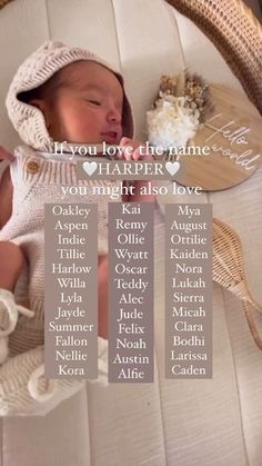 a baby is laying in a white chair with the names of its babies on it