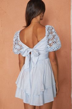 Steel blue dress  On or off-shoulder style  Lace, puff sleeves  Gathered detailing in bust  Tie-up back  Layered hem  Zipper in back   You'll be stealing hearts in our adorable Abby dress. We are obsessed with its lace sleeves and super cute, tie-up back! Perfect for a girls' day out, mimosa brunching and laughing 'til it hurts. Team it with a cute head scarf, mules and a tote. Blue Off-shoulder Puff Sleeve Dress, Fitted Blue Off-shoulder Puff Sleeve Dress, Fitted Off-shoulder Blue Puff Sleeve Dress, Light Blue Puff Sleeve Mini Dress For Brunch, Summer Light Blue Puff Sleeve Dress With Ruffles, Blue Puff Sleeve Dress With Smocked Back For Brunch, Light Blue Puff Sleeve Dress For Garden Party, Blue Puff Sleeve Mini Dress For Garden Party, Steel Blue Dress