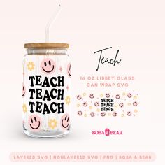 a glass jar with a straw in it that says teach and has smiley faces on it