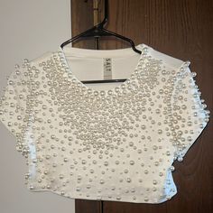 Size Small. White With Fake Pearls. Never Worn. Motivated To Sell! White Crew Neck Crop Top For Party, White Crop Top For Night Out, White Fitted T-shirt For Party, Casual White Shirt For Night Out, White Crew Neck Party Shirt, White Crew Neck Shirt For Party, White Crew Neck Top For Party, Casual White Blouse For Party, Casual White Party Blouse