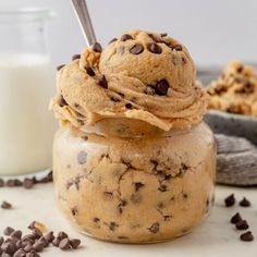 chocolate chip cookie dough in a jar with a spoon