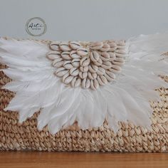 Introducing our stunning Boho Purse, handmade with love from natural raffia. This purse is the perfect accessory for your summer outfits, giving them a delightful tropical flair. Its intricate weaving and earthy tones effortlessly blend with any ensemble, making it a versatile must-have for your bohemian-inspired wardrobe. check it out for more details on Our Etsy Shop, link on bio. #artiliving #artilinestyle #artiinteriorproducts #bohochic #raffiapurse #summerstyle #tropicalvibes Handmade Summer Festival Clutch, Bohemian Woven Clutch In Natural Color, Bohemian Summer Clutch Rectangular, Bohemian Summer Clutch As Gift, Summer White Pouch Clutch, Bohemian Rectangular Clutch For Summer, Bohemian Handmade Clutch For Vacation, Bohemian Woven Natural Clutch, Bohemian Clutch As Summer Gift