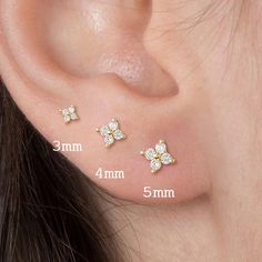 Gold Flower Stud Earrings Material: cubic zirconia - EARRINGS Earring Type: Stud Earrings - AAA+ Cubic Zirconia ( CZ ) Elegant Design:These dainty gold flower stud earrings feature a sophisticated and elegant design, perfect for adding a touch of class to any outfit.,Short Style:The short length of these earrings makes them ideal for those who prefer a more subtle yet stylish look.,Eye Catching:Designed to catch the eye, these earrings are great for those who want to make a bold fashion statemen Piercing Cartilage, Cartilage Jewelry, Clover Jewelry, Ear Ring, Butterfly Earrings Stud, Flower Stud Earrings, Flower Stud, Cubic Zirconia Earrings, Stud Earrings For Women